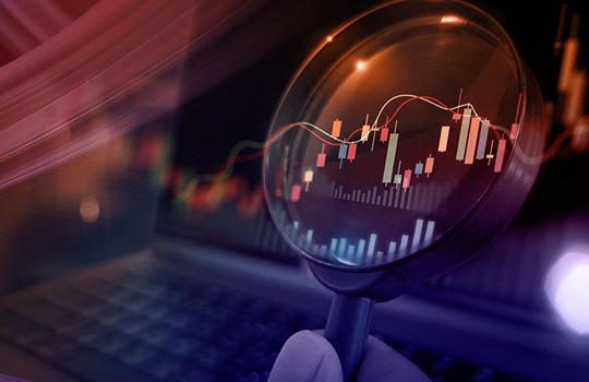 orange swirl and a magnifying glass over a computer with data