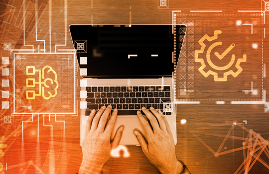 person using laptop and icon designs
