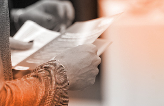 Person reading an information document