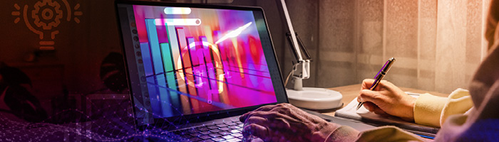 Person, die an einem Laptop mit mehrfarbigem Bildschirm arbeitet 