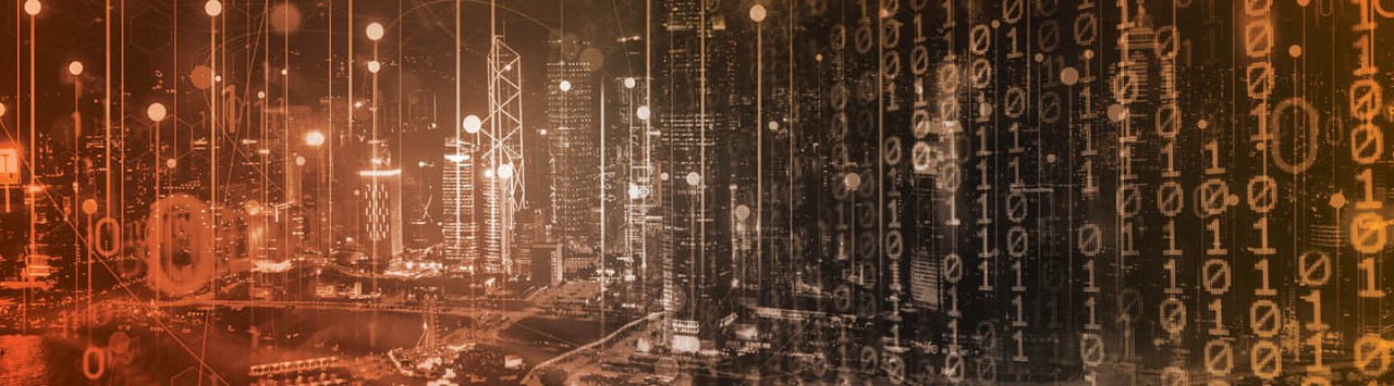 lines of binary code imposed over a cityscape