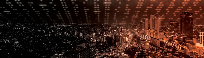 Wolkenkratzer beleuchten eine Stadt bei Nacht