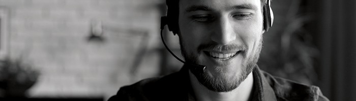 A man talking on a headset