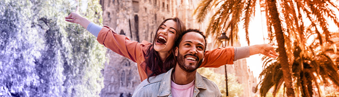 Two happy travelers enjoying a tropical vacation.
