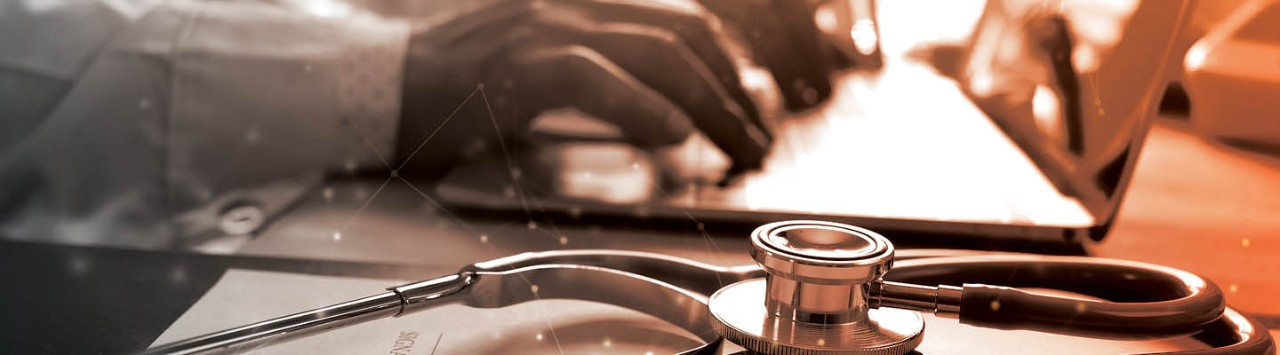 Clinical researchers entering data 