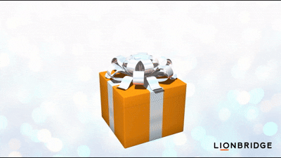 Gift box spins and opens, revealing “A New Year’s Wish” and the em dash popping out as a surprise.