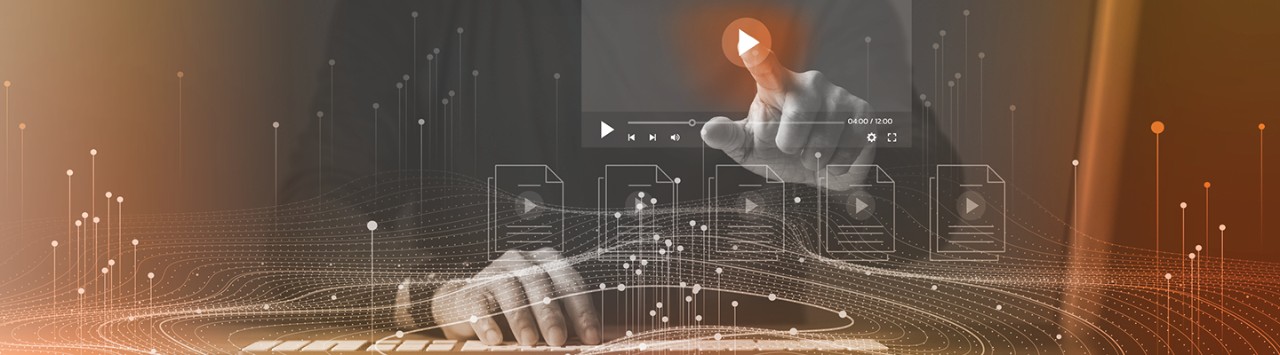 person reviewing data patterns through an orange lens