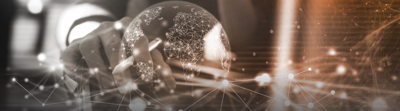 person touching digital globe image