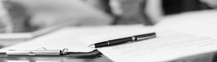 Pen on top of documents