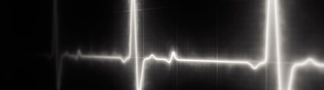 A glowing white line reminiscent of a heartbeat on a cardiogram