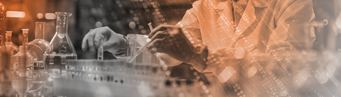 Clinical researchers using beakers in a lab