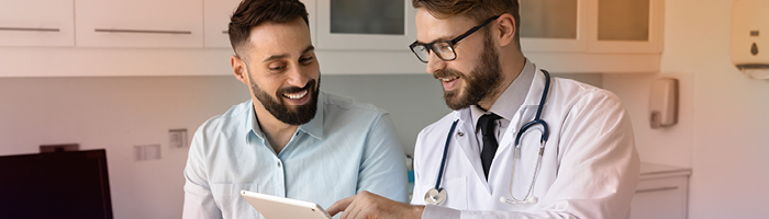 patient and clinical researcher reviewing a COA 