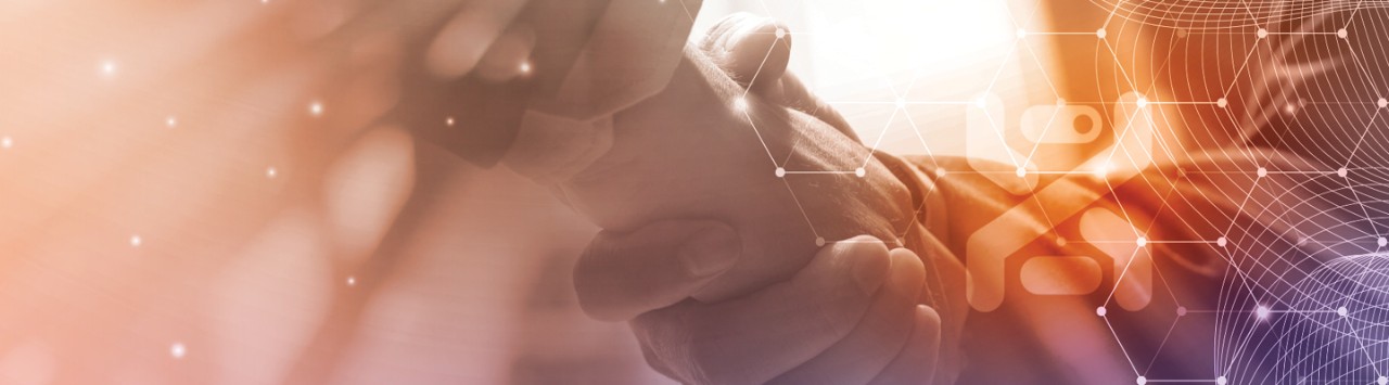 people hold hands with hexagonal, digitized overlay