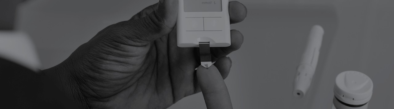 A patient doing a test with a tiny medical device