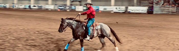 Doug riding a horse