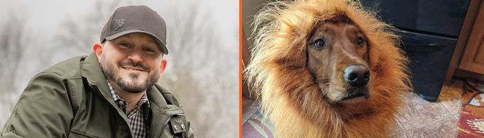 Mike and one of his dogs, who is wearing a lion's mane.