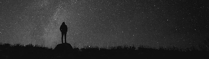 person looking at the night sky