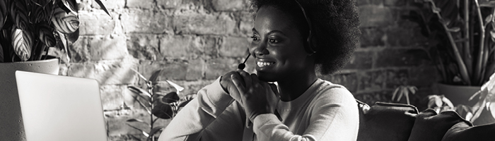 An interpreter speaking on a headset