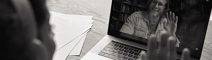 Two people speaking via video call 