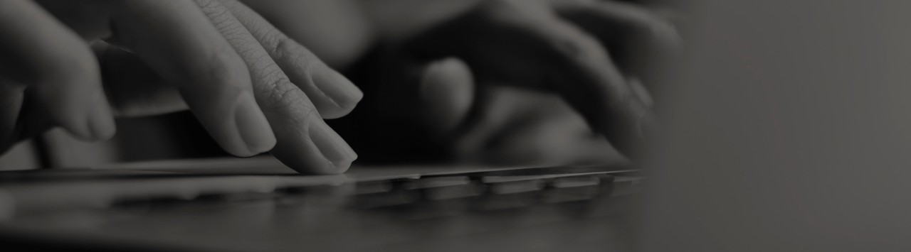 Someone typing on a keyboard