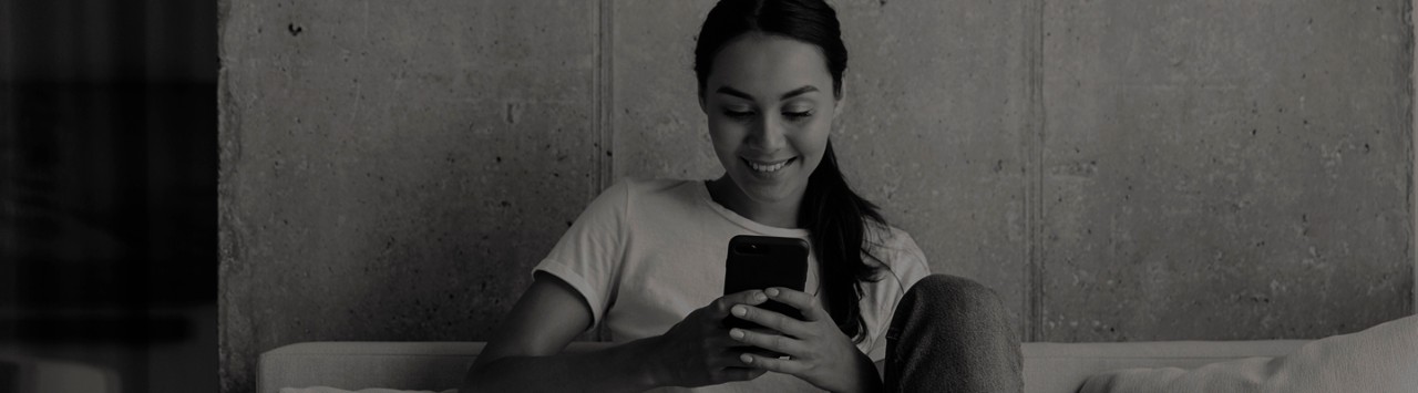 A woman looking at her phone