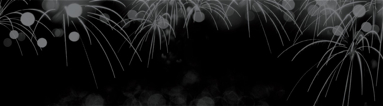 Starbursts on a dark background that is studded by circles of light
