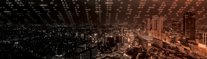 Skyscrapers illuminate city at night
