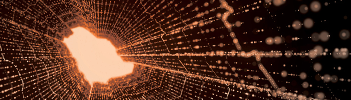 Strings of beaded orange lights in a dark tunnel lead to a bright opening