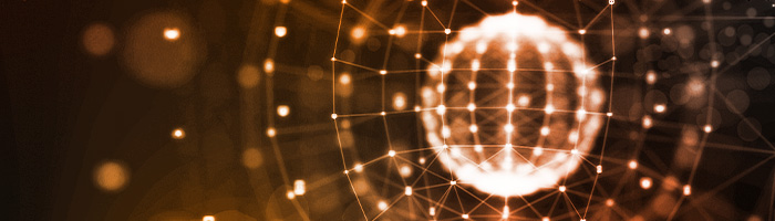 An illuminated sphere with geometric patterns represents Smart MT™’s impact on global communication.