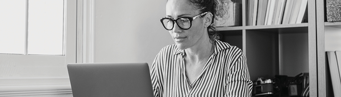 A woman working on a laptop