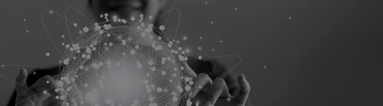 Person holding a globe with connection lines