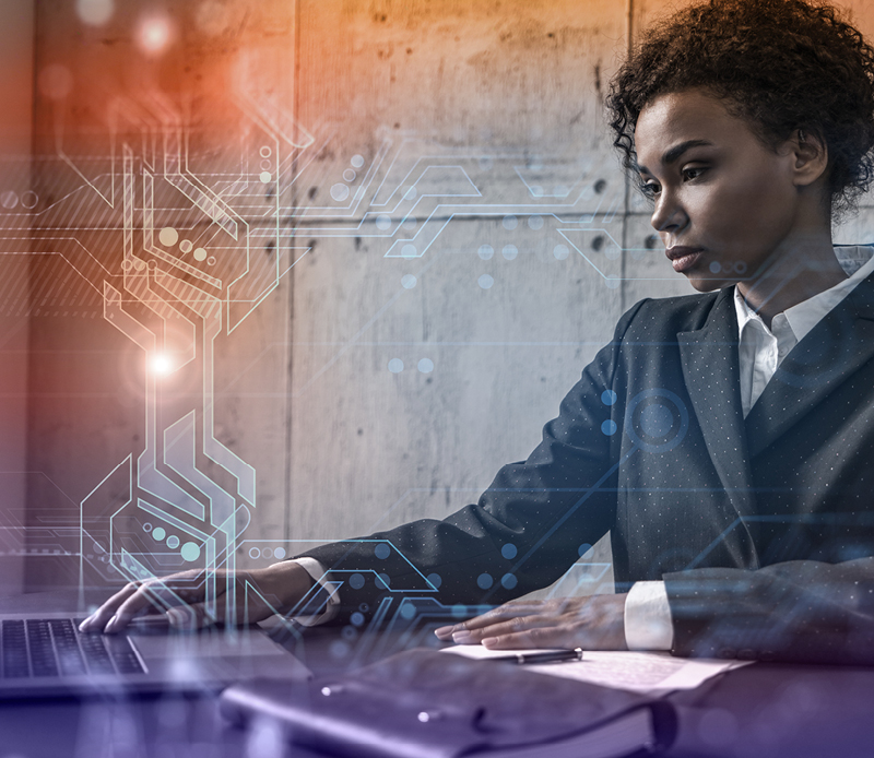 person reading documents on a computer