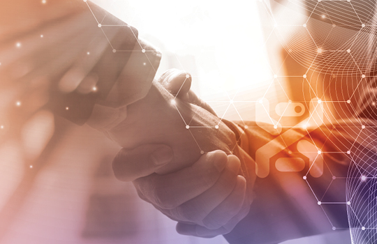 people hold hands with hexagonal, digitized overlay