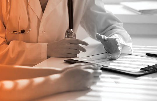 Doctor reviewing clinical trial results