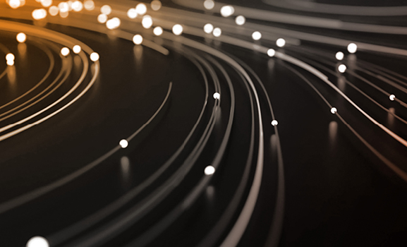 Light streaks representing the speed and efficiency of Lionbridge Aurora AI technology.