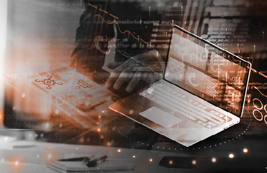 laptop computer and digital charts