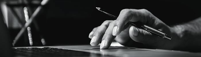 A man typing on a keyboard