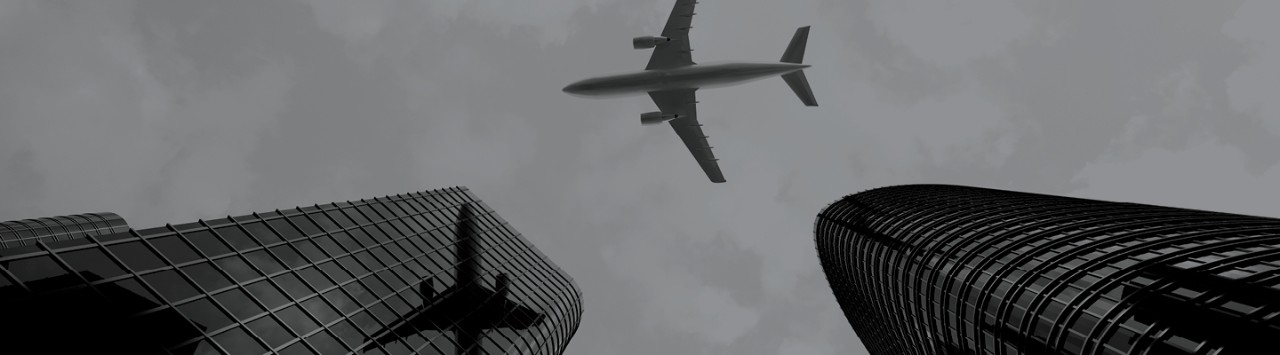 A plane flying over a city