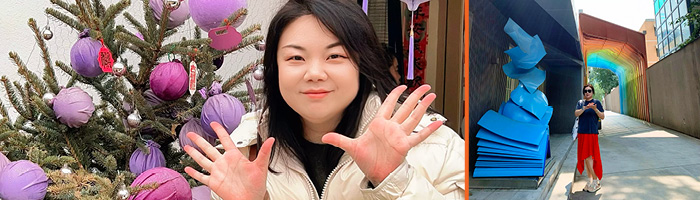 屋外アート展示の前に立つリン。