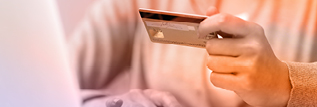 Person holding credit card