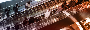 People on Escalator at a mall