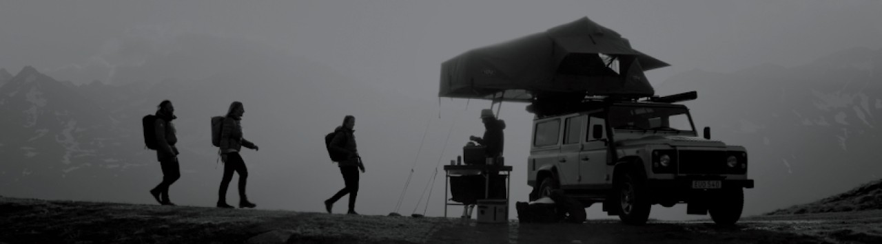 Four people camping 