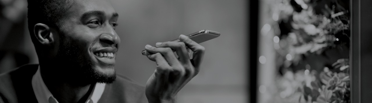 A man uses a cell phone 