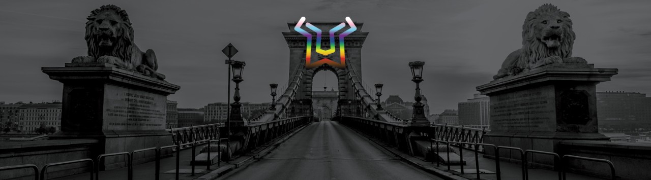 The Lionbridge Pride Progress flag overlays an image of a bridge.